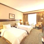 اتاق Deluxe Double Room در هتل Grand Central Hotel با طراحی کلاسیک و دکوراسیون گرم